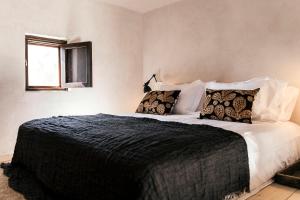 Posteľ alebo postele v izbe v ubytovaní Casita Casita Lindos - Adults Only