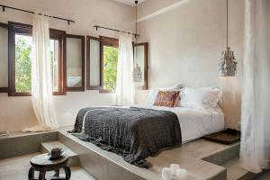 Posteľ alebo postele v izbe v ubytovaní Casita Casita Lindos - Adults Only