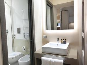 Een badkamer bij Quirinale Luxury Rooms