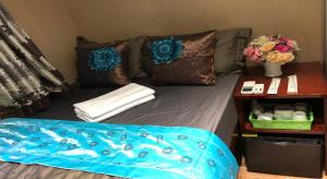 Voodi või voodid majutusasutuse Rich Hostel toas
