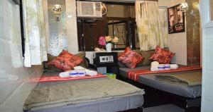 Voodi või voodid majutusasutuse Rich Hostel toas