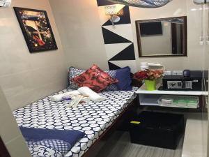 Voodi või voodid majutusasutuse Rich Hostel toas