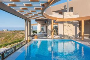 アギア・ペラギアにあるMinimalist Mediterranean Blue key Villa with Sea View Infinity Poolのギャラリーの写真