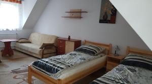 Posteľ alebo postele v izbe v ubytovaní Pełny Relaks - Sajenek