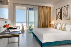 Posteľ alebo postele v izbe v ubytovaní Savoia Hotel Rimini