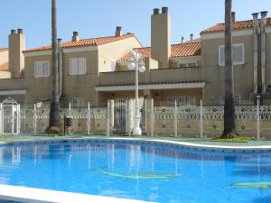 Bazén v ubytovaní VTV Amores Residencial2000 alebo v jeho blízkosti