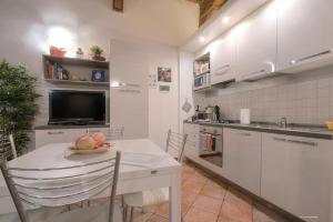 Kuchyňa alebo kuchynka v ubytovaní Wine Apartments Florence Moscato