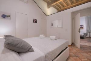 Posteľ alebo postele v izbe v ubytovaní Wine Apartments Florence Moscato