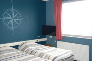 Posteľ alebo postele v izbe v ubytovaní Buitenplaats T Ges