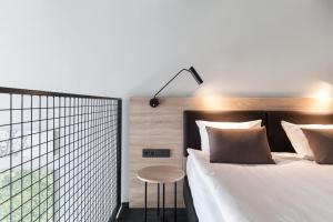 Loop Hotel Vilnius 객실 침대