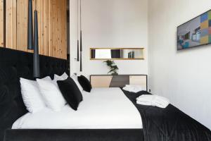 Loop Hotel Vilnius 객실 침대