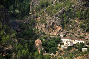 a view of a mountain with houses and trees at Casa rural La Libelula Ayna in Ayna