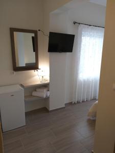 TV/Unterhaltungsangebot in der Unterkunft Nostos Apartments