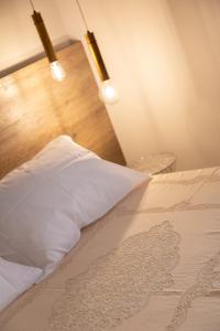 Postel nebo postele na pokoji v ubytování Filinona B&B