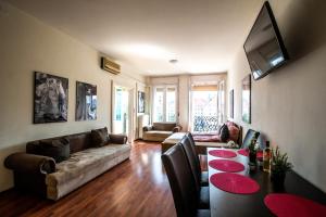 a living room with a couch and a table at TOP LOCATION BUDAPEST in Budapest