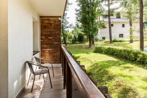 Vonkajšia záhrada v ubytovaní Zakopiański Apartament