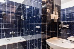 Kúpeľňa v ubytovaní Zakopiański Apartament + 8 fotografií