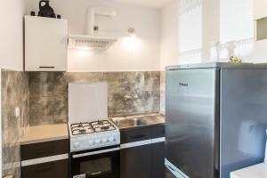 Kuchyňa alebo kuchynka v ubytovaní Zakopiański Apartament