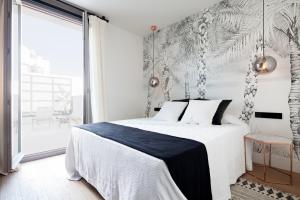 Posteľ alebo postele v izbe v ubytovaní Casa Noa Apartments