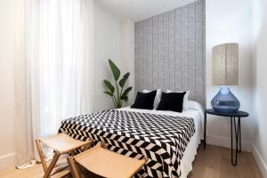 Posteľ alebo postele v izbe v ubytovaní Casa Noa Apartments