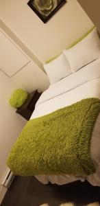 Кровать или кровати в номере Paradis de vacances