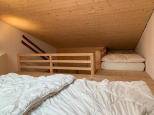 Voodi või voodid majutusasutuse Mira Selva toas