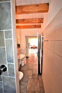 Ванна кімната в Ostseeliebe-Erd-Links-3-KK-H