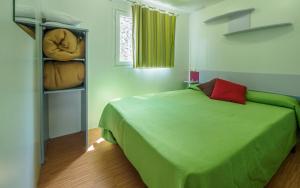 Cama o camas de una habitación en Camping Alberg Municipal Tivissa