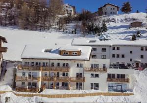 Collina Hotel Garni v zimě