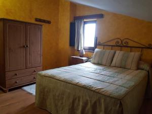 Кровать или кровати в номере Hostería Carmen