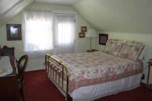 Postel nebo postele na pokoji v ubytování Virginia Creek Settlement