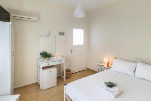 Postel nebo postele na pokoji v ubytování Sunset hotel