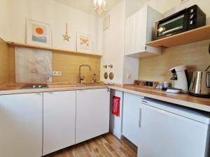 Kuchyň nebo kuchyňský kout v ubytování Allgäu Apartment Kempten