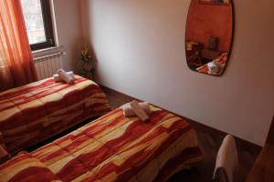 Postel nebo postele na pokoji v ubytování La Brezza del Pollino