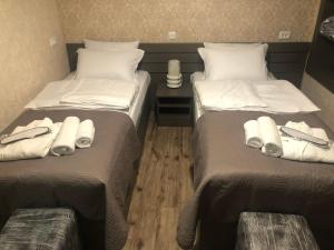 A bed or beds in a room at Paradise Kazbegi