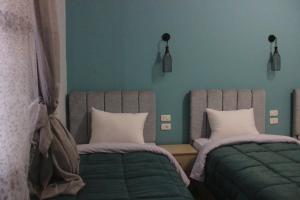 Voodi või voodid majutusasutuse Cheers Hostel Cairo toas