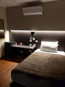 Katil atau katil-katil dalam bilik di Hotel Riogrande - Habilitado