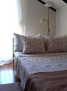 Postel nebo postele na pokoji v ubytování Casa del Padre - Annabelle