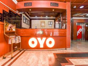 a store with an ovo sign on the wall at Melody Queen Hotel by AURA in Dubai