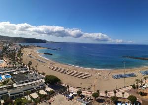 an aerial view of a beach and the ocean at Oliva Home in Los Cristianos