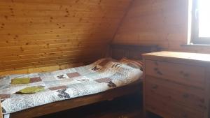 Posteľ alebo postele v izbe v ubytovaní Chata Starych Znajomych