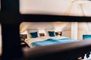Postel nebo postele na pokoji v ubytování Hotel Hoogeveen