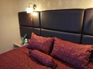 Postel nebo postele na pokoji v ubytování Károlyi Panzió