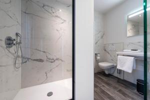 Koupelna v ubytování Hotel Monarc