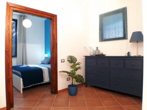 Posteľ alebo postele v izbe v ubytovaní Alloggio turistico La Casa del Vignola
