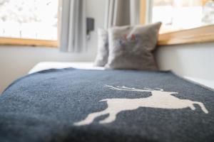 Postel nebo postele na pokoji v ubytování Alpenzeit