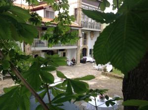 Jardín al aire libre en Hosteria de Arnuero