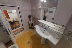 Koupelna v ubytování Kavala Rooms
