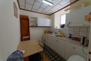 Kuchyň nebo kuchyňský kout v ubytování Kavala Rooms