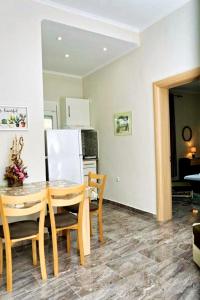 Kuchyň nebo kuchyňský kout v ubytování Cristi Apartments